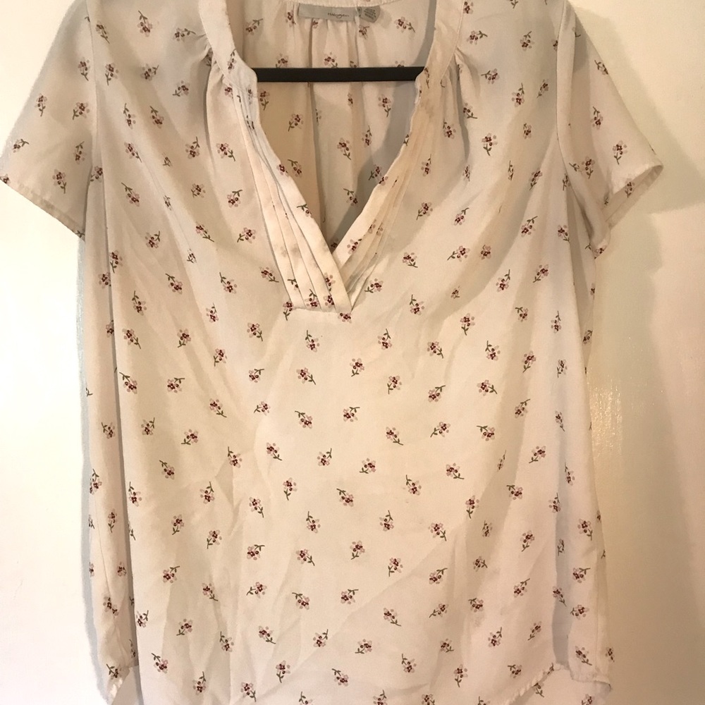 Blouse with pleated neckline and small flower print